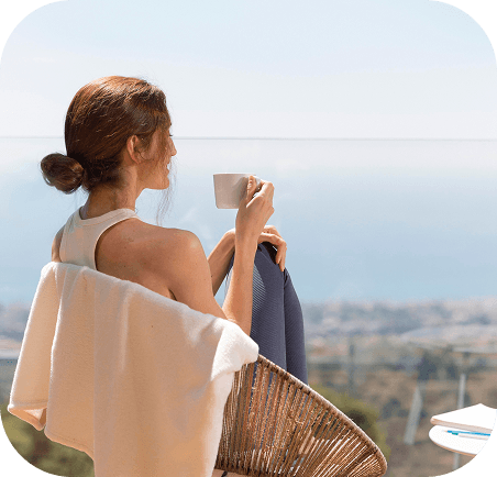 Woman enjoying wellness experience with a view